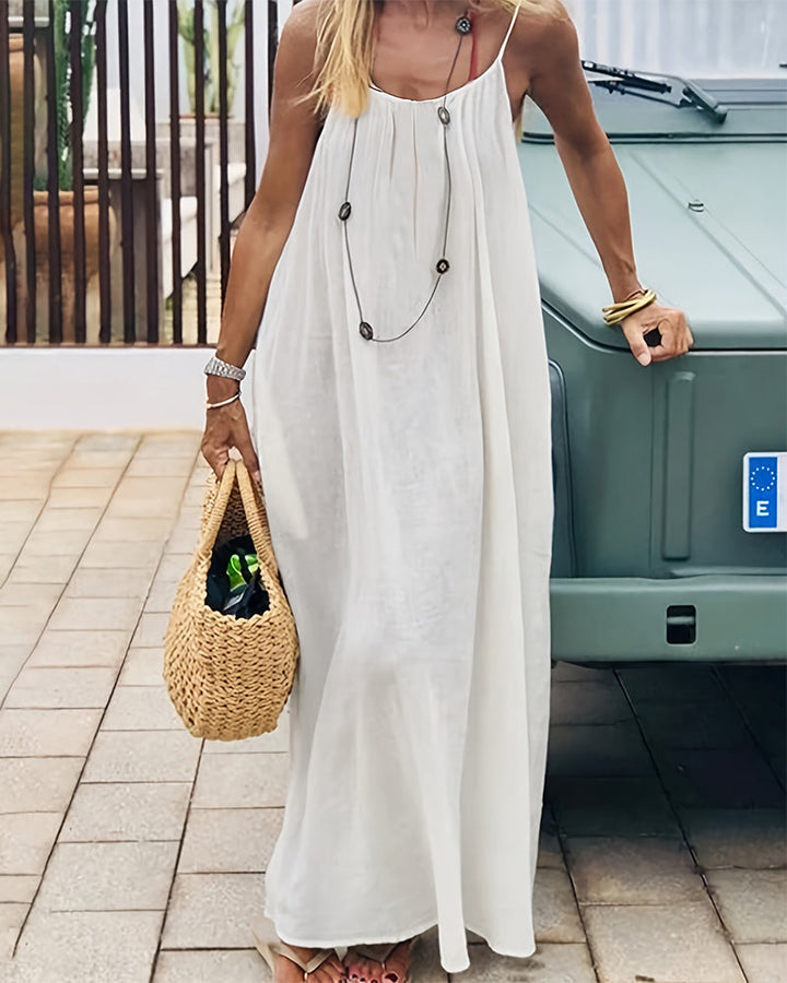 Robe longue femme dos nu à bretelles fines style fluide