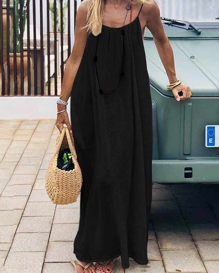 Robe longue femme dos nu à bretelles fines style fluide