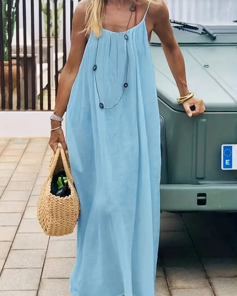 Robe longue femme dos nu à bretelles fines style fluide