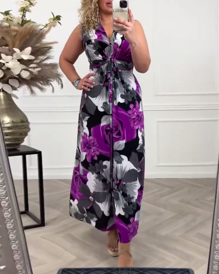 Robe maxi fleurie violette, vue complète montrant la longueur maxi fluide et les sandales compensées